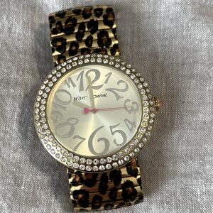 Women’s Betsy Johnson stretch band watch.